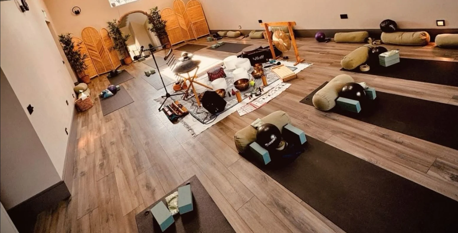 Participants resting during a sound bath
